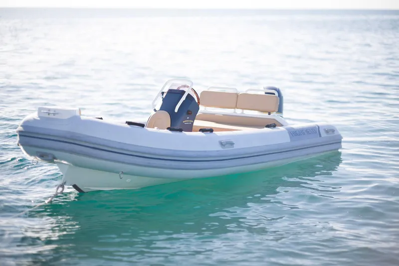 Andromeda Yacht Photos Pics Inflatable boat on calm sea, associated with Lagoon 620, 2016 model.