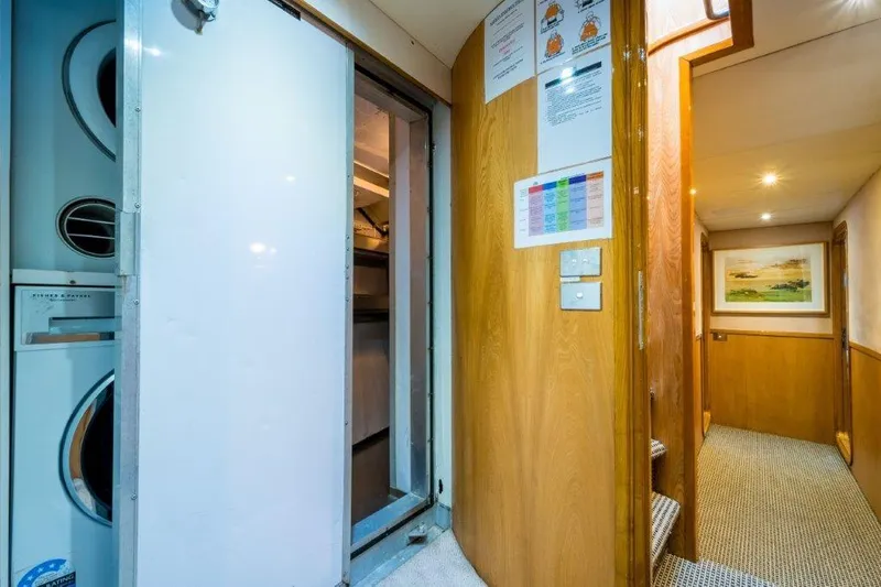 Atlantic Princess Yacht Photos Pics Interior hallway of 1992 GeTa 86ft Motor Yacht with laundry area.
