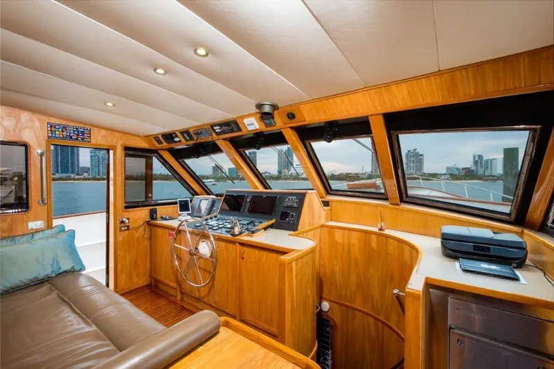 Atlantic Princess Yacht Photos Pics Luxurious 1992 GeTa 86ft Motor Yacht interior with panoramic windows and modern navigation equipment.