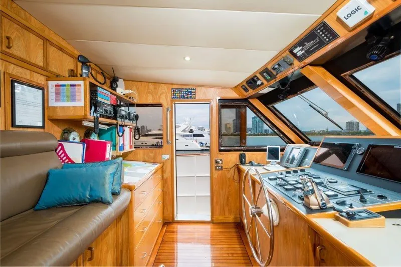 Atlantic Princess Yacht Photos Pics Interior of 1992 GeTa 86ft Motor Yacht with wooden helm and navigation equipment.