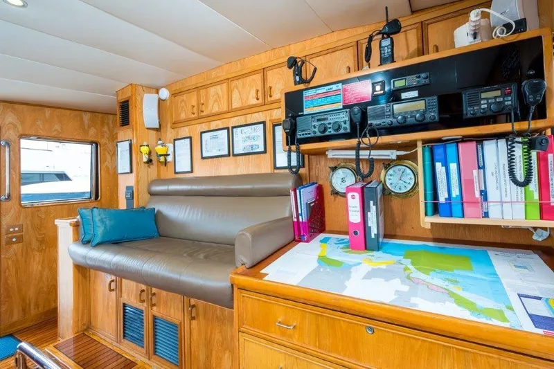 Atlantic Princess Yacht Photos Pics Interior of 1992 GeTa 86ft Motor Yacht with navigation equipment and seating area.