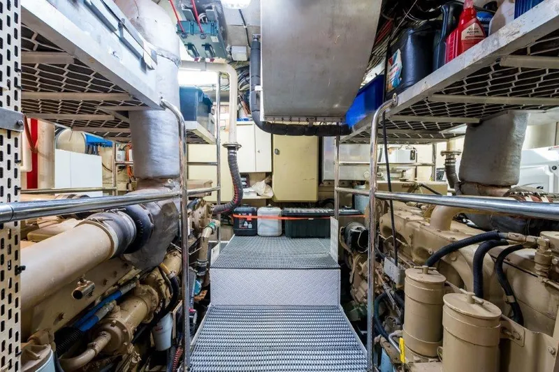 Atlantic Princess Yacht Photos Pics Engine room of 1992 Custom GeTa 86ft Motor Yacht, showcasing machinery and equipment.