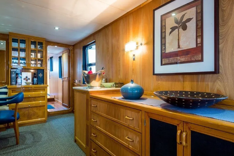 Atlantic Princess Yacht Photos Pics Luxurious interior of 1992 GeTa 86ft Motor Yacht with elegant wood paneling and decor.