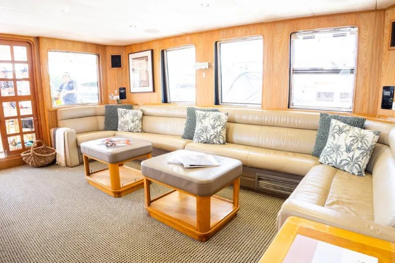 Atlantic Princess Yacht Photos Pics Luxurious interior of 1992 GeTa 86ft Motor Yacht with plush seating and elegant decor.