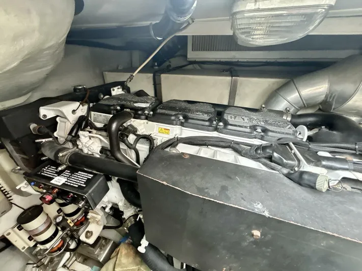  Yacht Photos Pics Engine room of 2011 Azimut 62S Italia yacht, showcasing mechanical components and systems.