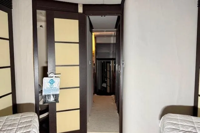  Yacht Photos Pics Interior hallway of 2011 Azimut 62S Italia yacht with modern design elements.
