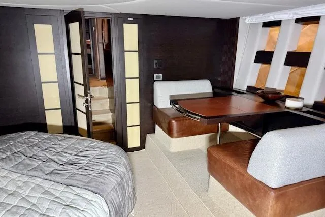  Yacht Photos Pics Luxurious interior of 2011 Azimut 62S Italia yacht with modern dining area and cozy bedroom.