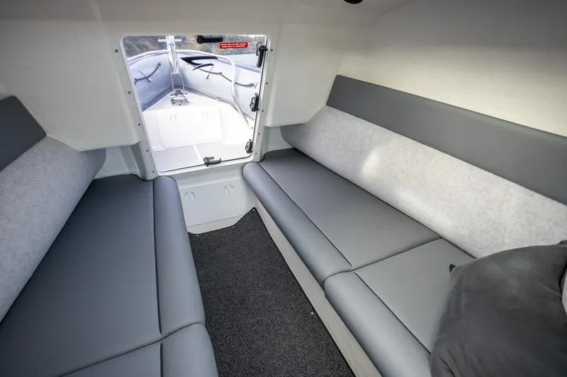  Yacht Photos Pics Interior cabin of 2020 Protector 310 Targa boat with gray seating.