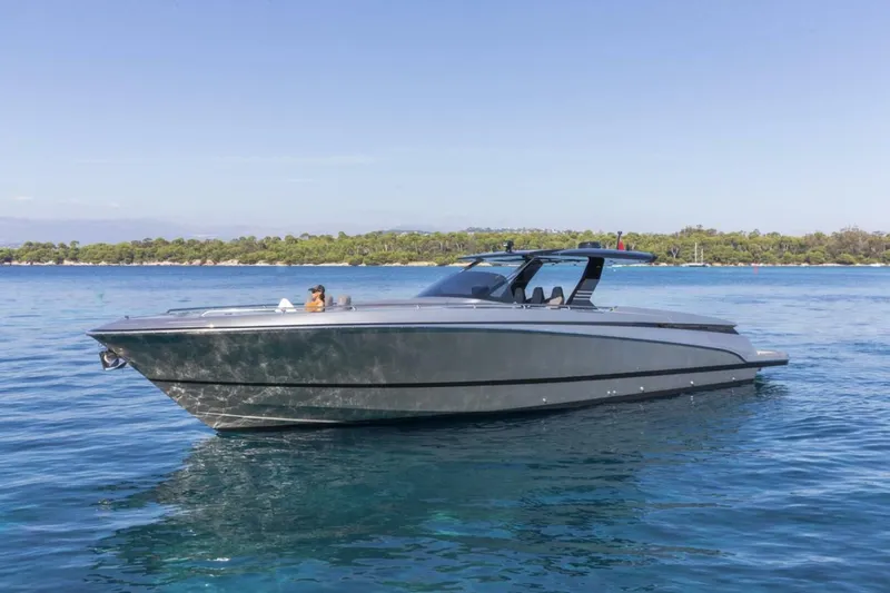  Yacht Photos Pics 2026 Canados GLADIATOR 493 GRAND yacht cruising on serene blue waters.