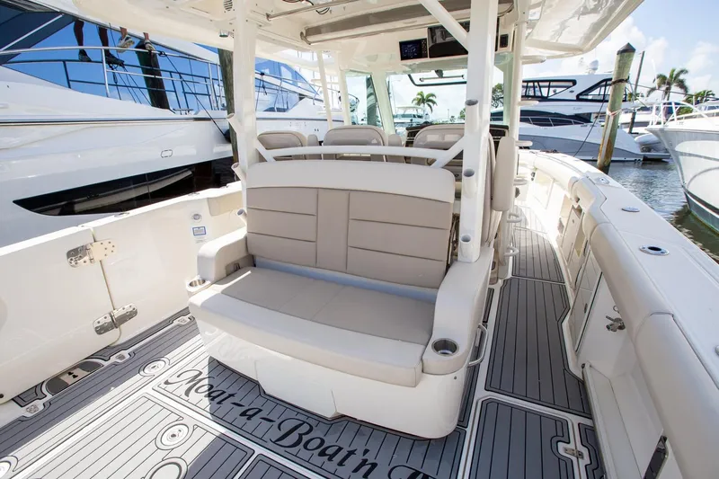  Yacht Photos Pics 2019 Boston Whaler 380 Outrage interior with seating and deck details.