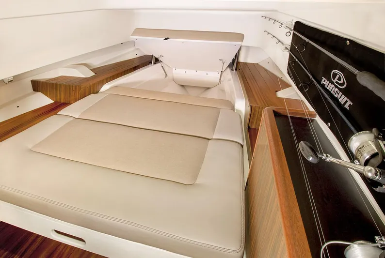  Yacht Photos Pics Manufacturer Provided Image: 2019 Pursuit S 328 Sport boat interior with cushioned seating and wooden accents.