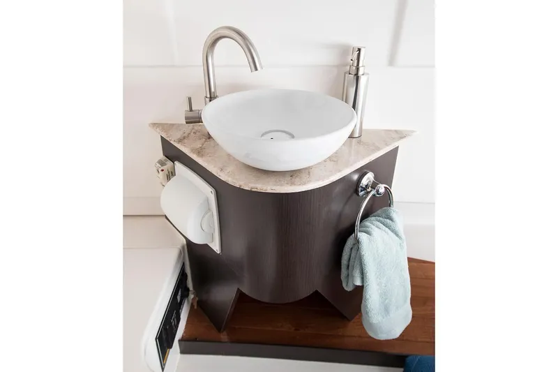  Yacht Photos Pics Manufacturer Provided Image: Compact bathroom sink in 2019 Pursuit S 328 Sport boat.