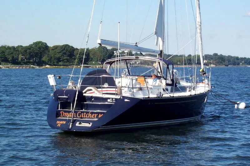 Blue Yacht Photos Pics Sailing yacht "Dream Catcher" on water, C&C 51 XL C/B, 1994 model.