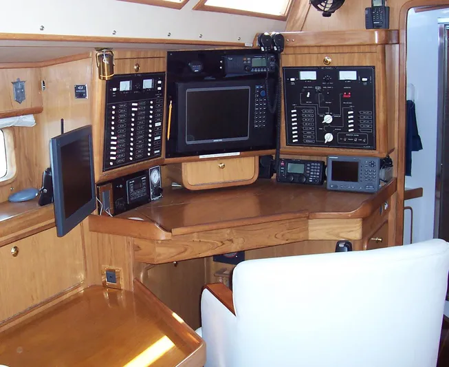 Blue Yacht Photos Pics Navigation station of 1994 C&C 51 XL C/B yacht with control panels and electronics.