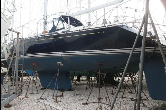 Blue Yacht Photos Pics Sailboat C&C 51 XL C/B 1994 on stands in a boatyard.
