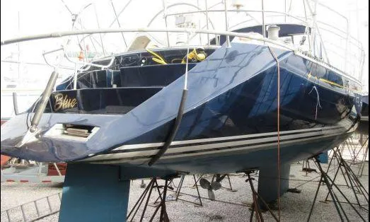 Blue Yacht Photos Pics C&C 51 XL C/B 1994 sailboat on stands, blue hull, rear view.