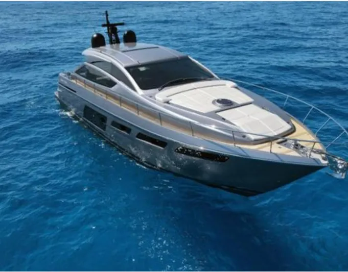 Our Trade Yacht Photos Pics 2022 Pershing 6X yacht cruising on clear blue ocean waters.