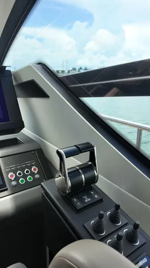 Our Trade Yacht Photos Pics Control panel of 2022 Pershing 6X yacht, featuring throttle and joystick controls.