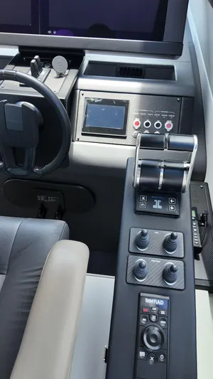 Our Trade Yacht Photos Pics Control panel of 2022 Pershing 6X yacht with advanced navigation and steering systems.