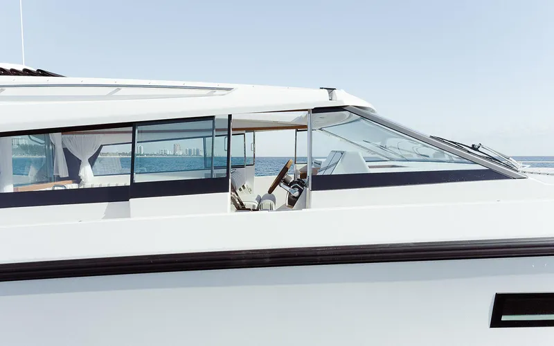  Yacht Photos Pics Delta Powerboats 48 Coupe 2026, sleek design, side view, modern yacht on calm sea.