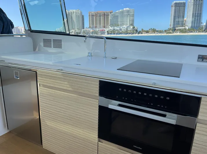  Yacht Photos Pics Modern kitchen interior on 2026 Delta Powerboats 48 Coupe with ocean view.