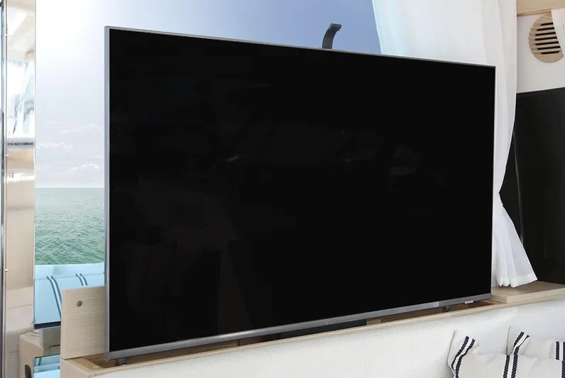  Yacht Photos Pics Flat-screen TV on Delta Powerboats 48 Coupe, 2026 model, with ocean view.