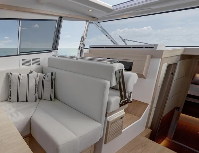 Yacht Photos Pics Interior of 2026 Delta Powerboats 48 Coupe, featuring modern seating and ocean view.