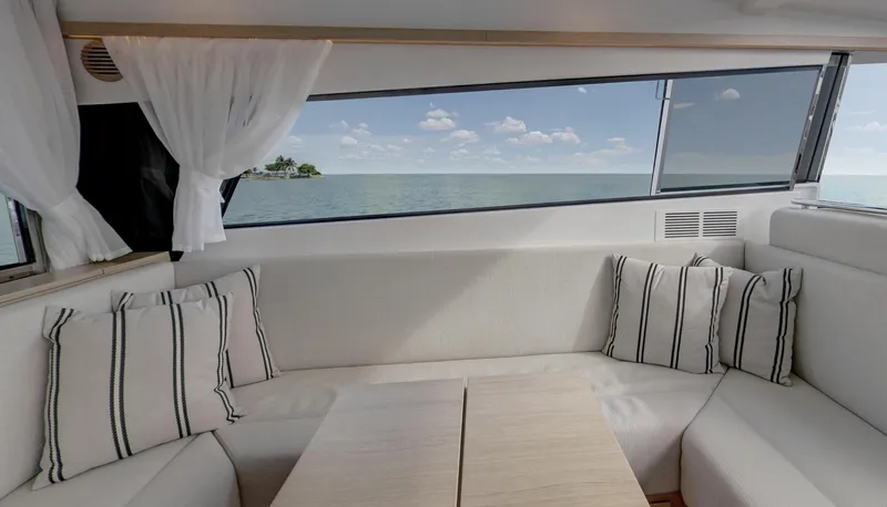  Yacht Photos Pics Interior of 2026 Delta Powerboats 48 Coupe with ocean view through large windows.