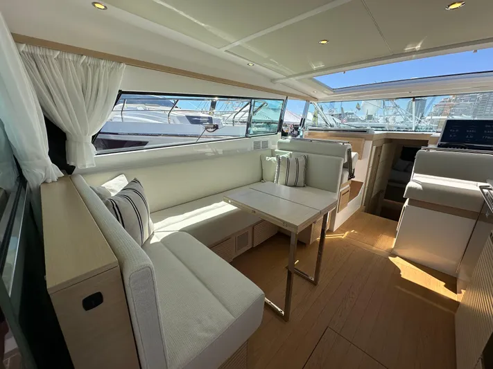  Yacht Photos Pics Luxurious interior of 2026 Delta Powerboats 48 Coupe with elegant seating and modern design.