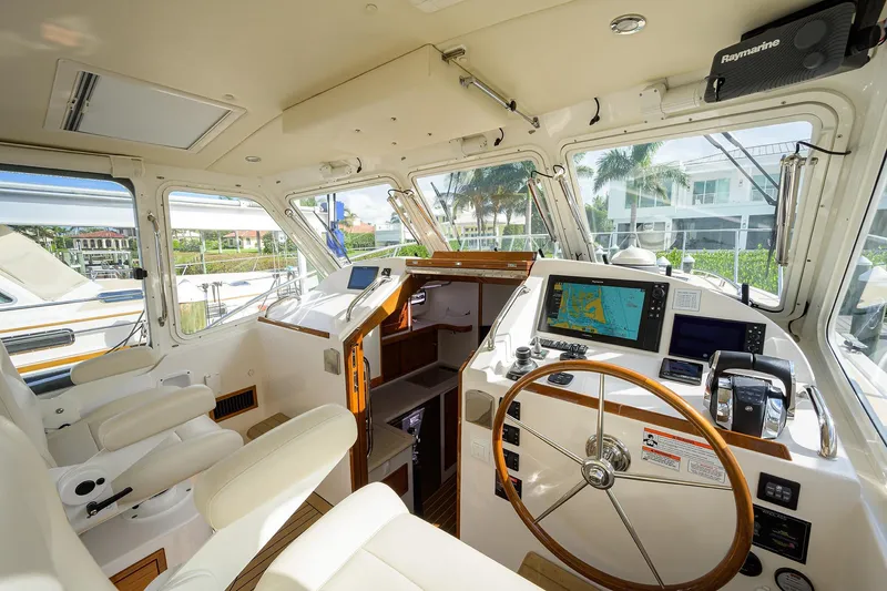 Scout Yacht Photos Pics 2019 MJM 43z yacht cockpit with navigation equipment and luxurious seating.