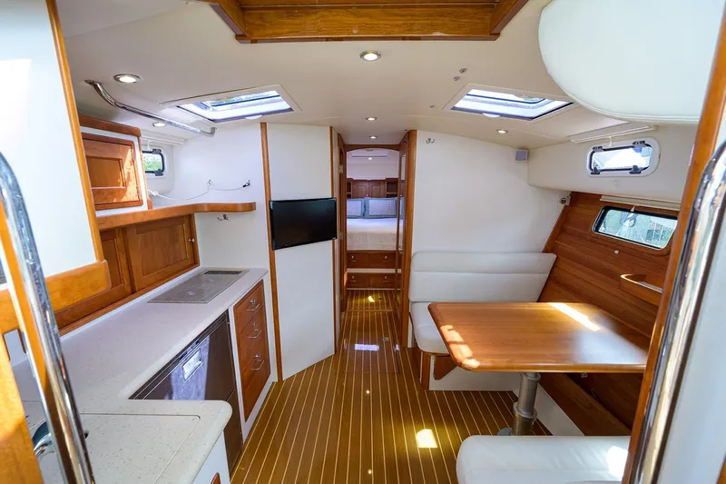 Scout Yacht Photos Pics Luxurious interior of 2019 MJM 43z yacht with wood finishes and modern amenities.