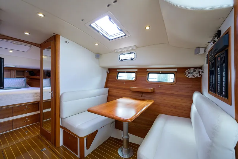 Scout Yacht Photos Pics Interior of 2019 MJM 43z yacht with cozy seating and wooden accents.