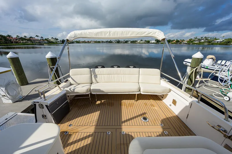 Scout Yacht Photos Pics Luxury 2019 MJM 43z yacht with spacious deck and comfortable seating by the water.