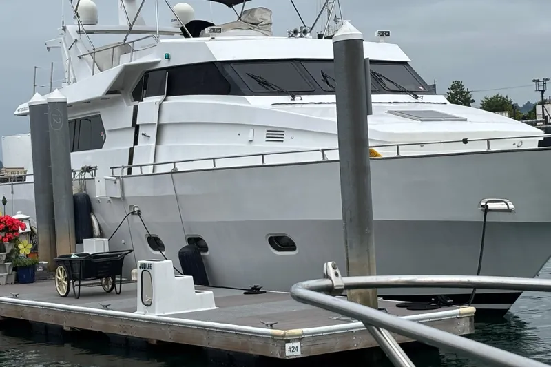  Yacht Photos Pics Luxury Maiora Phantom yacht docked at marina, 1986 model.