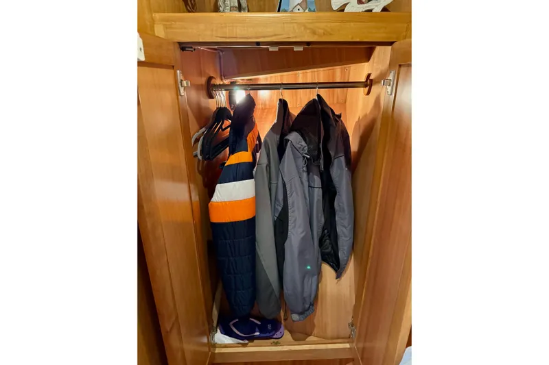 Eagles Soar Yacht Photos Pics Wardrobe in 2000 Hampton 490 yacht with jackets and shoes.
