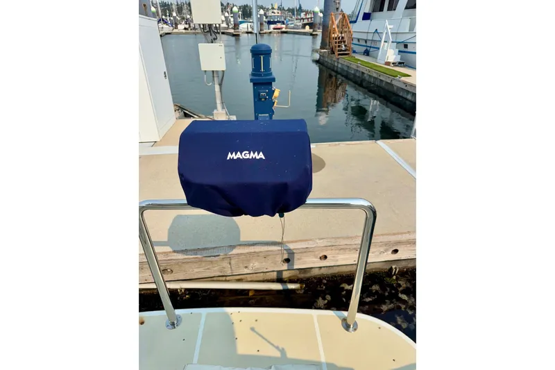 Eagles Soar Yacht Photos Pics Boat dock with Magma grill cover on Hampton 490, year 2000.