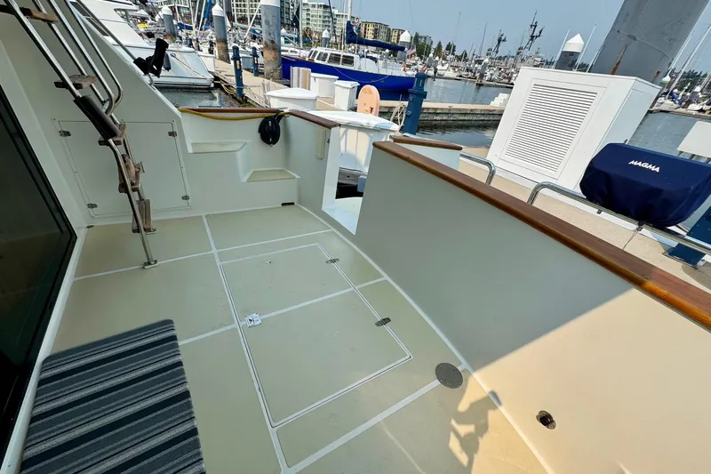 Eagles Soar Yacht Photos Pics Deck of a 2000 Hampton 490 yacht docked at a marina.