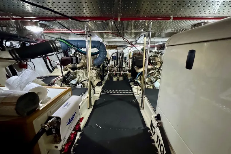 Eagles Soar Yacht Photos Pics Engine room of a 2000 Hampton 490 yacht, showcasing machinery and equipment.