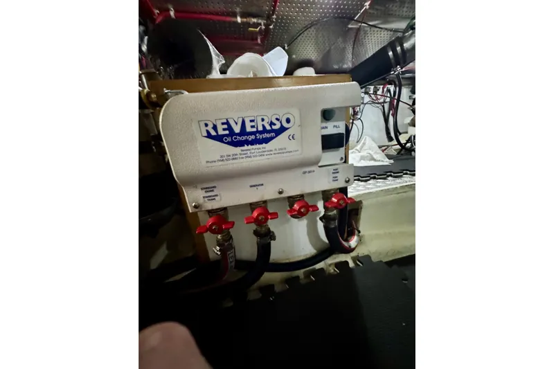 Eagles Soar Yacht Photos Pics Reverso oil change system in 2000 Hampton 490 engine room.