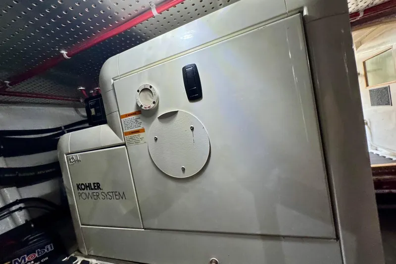 Eagles Soar Yacht Photos Pics Kohler power system in a 2000 Hampton 490 yacht engine room.