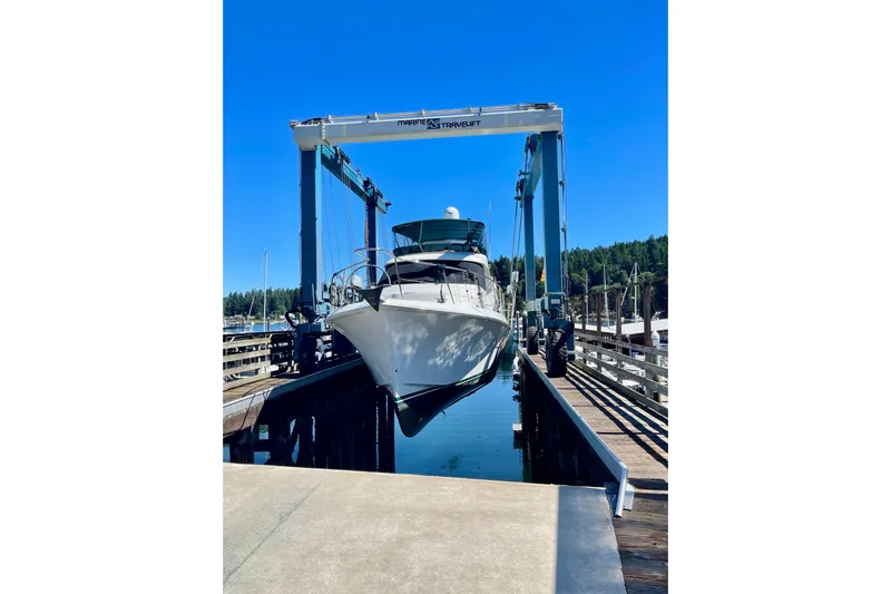 Eagles Soar Yacht Photos Pics Hampton 490 yacht from 2000 in a boat lift at a marina.