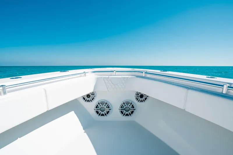  Yacht Photos Pics 2023 Contender 39 ST boat bow with ocean view and clear blue sky.