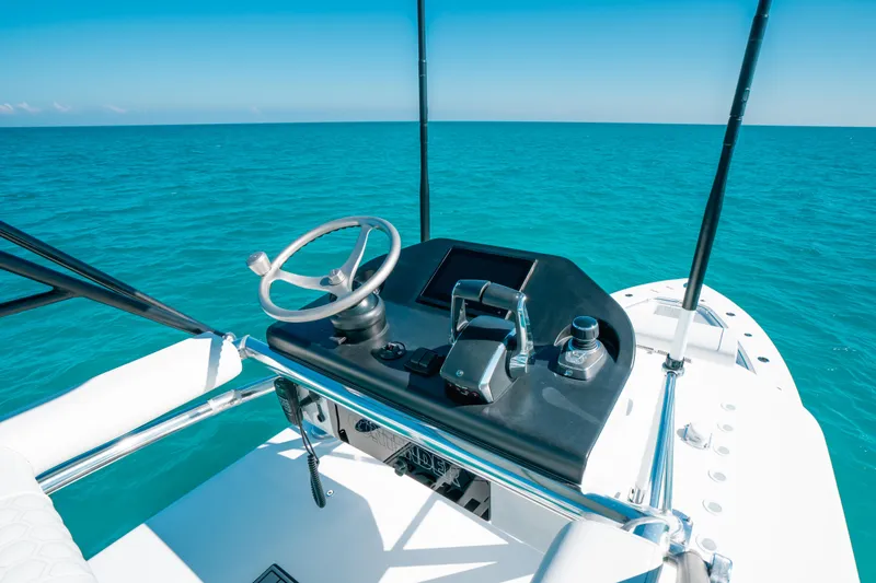  Yacht Photos Pics 2023 Contender 39 ST boat helm on open ocean.