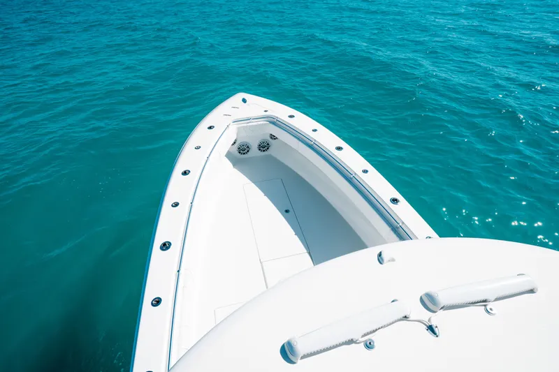  Yacht Photos Pics 2023 Contender 39 ST boat on clear blue water.