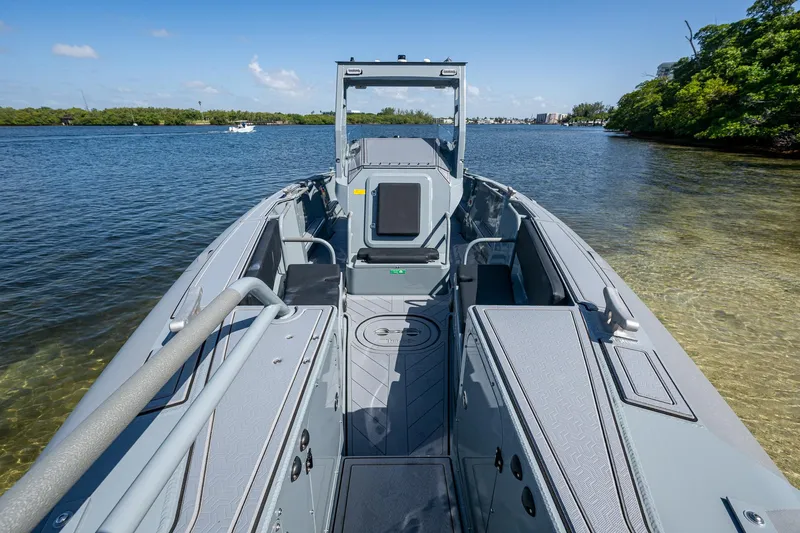  Yacht Photos Pics 2023 SAFE Boats Interceptor on calm water, showcasing sleek design and advanced features.