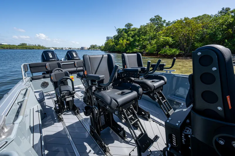  Yacht Photos Pics 2023 SAFE Boats Interceptor with advanced seating, cruising on a scenic waterway.