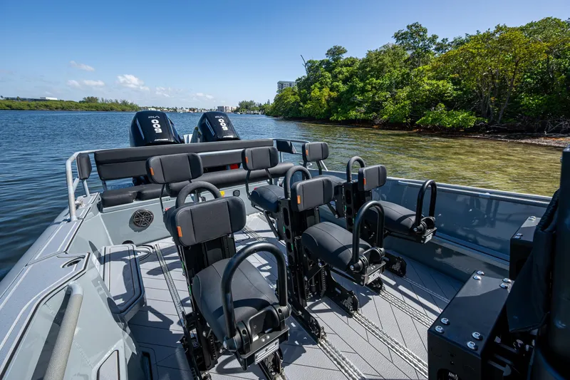  Yacht Photos Pics 2023 SAFE Boats Interceptor on water, featuring multiple seats and powerful engines.