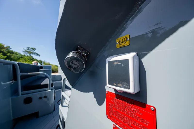  Yacht Photos Pics 2023 SAFE Boats Interceptor with electrical components and safety warnings.