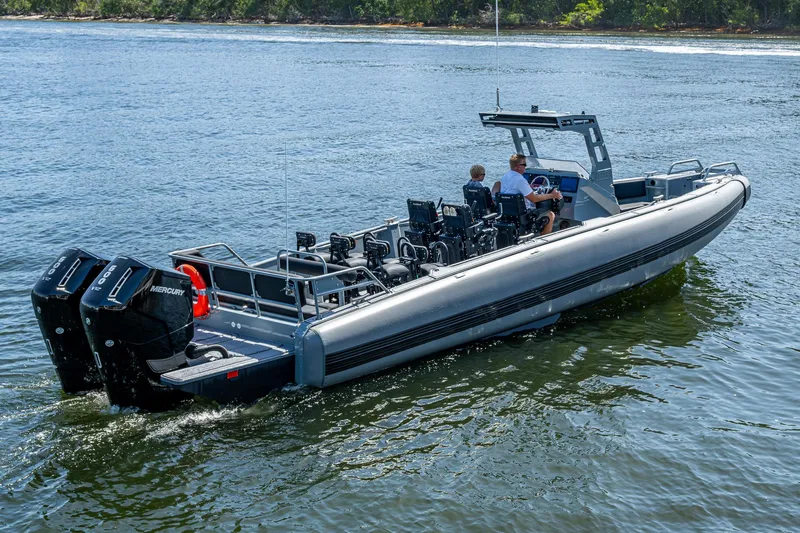  Yacht Photos Pics 2023 SAFE Boats Interceptor on water, featuring dual Mercury engines, sleek design, and advanced navigation.