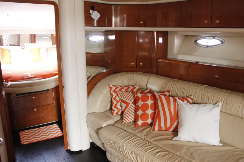 Euphoria 1 Yacht Photos Pics Luxurious interior of 2000 Sea Ray 540 Sundancer yacht with stylish orange accents.
